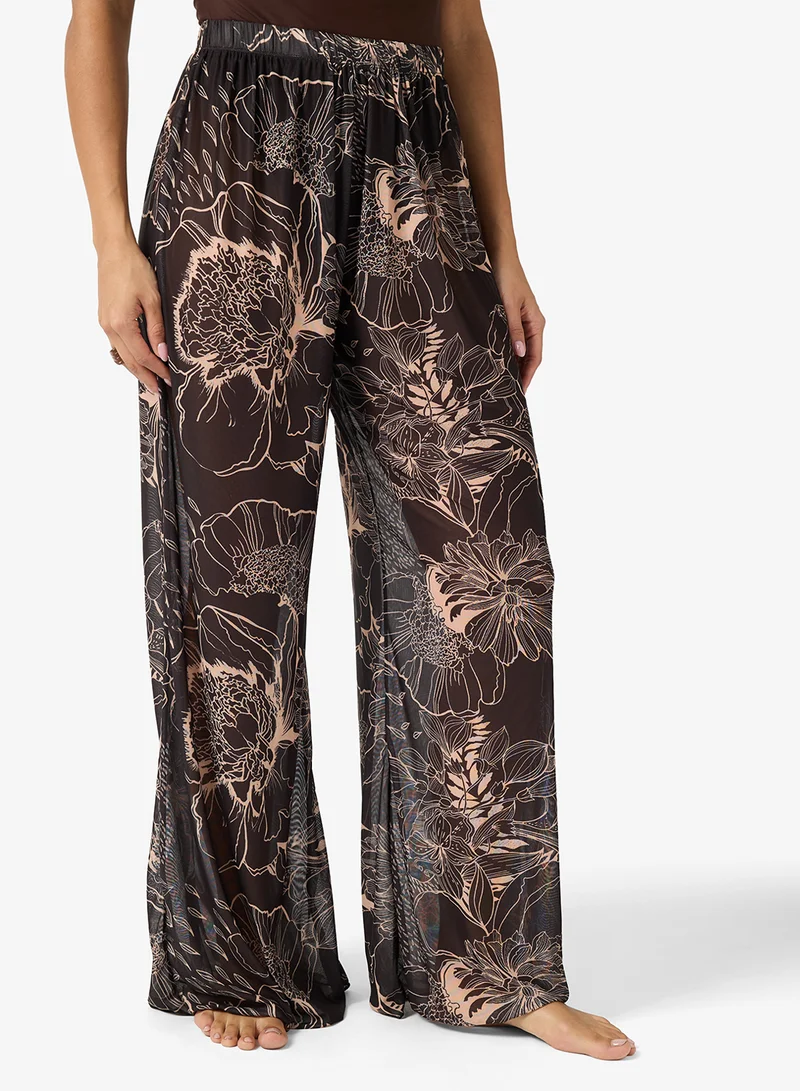 ايلا بنطلون شاطئ شفاف مطبوع